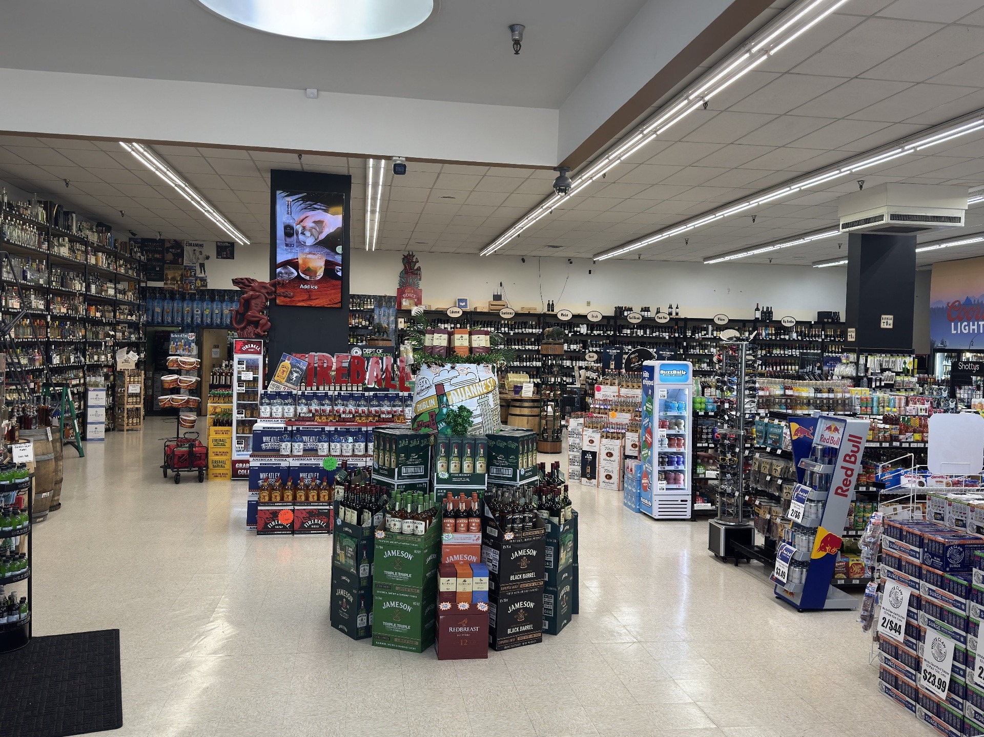Spacious, well-lit liquor store interior